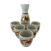 Far Eastern porcelain sake service consisting of a carafon and six cups