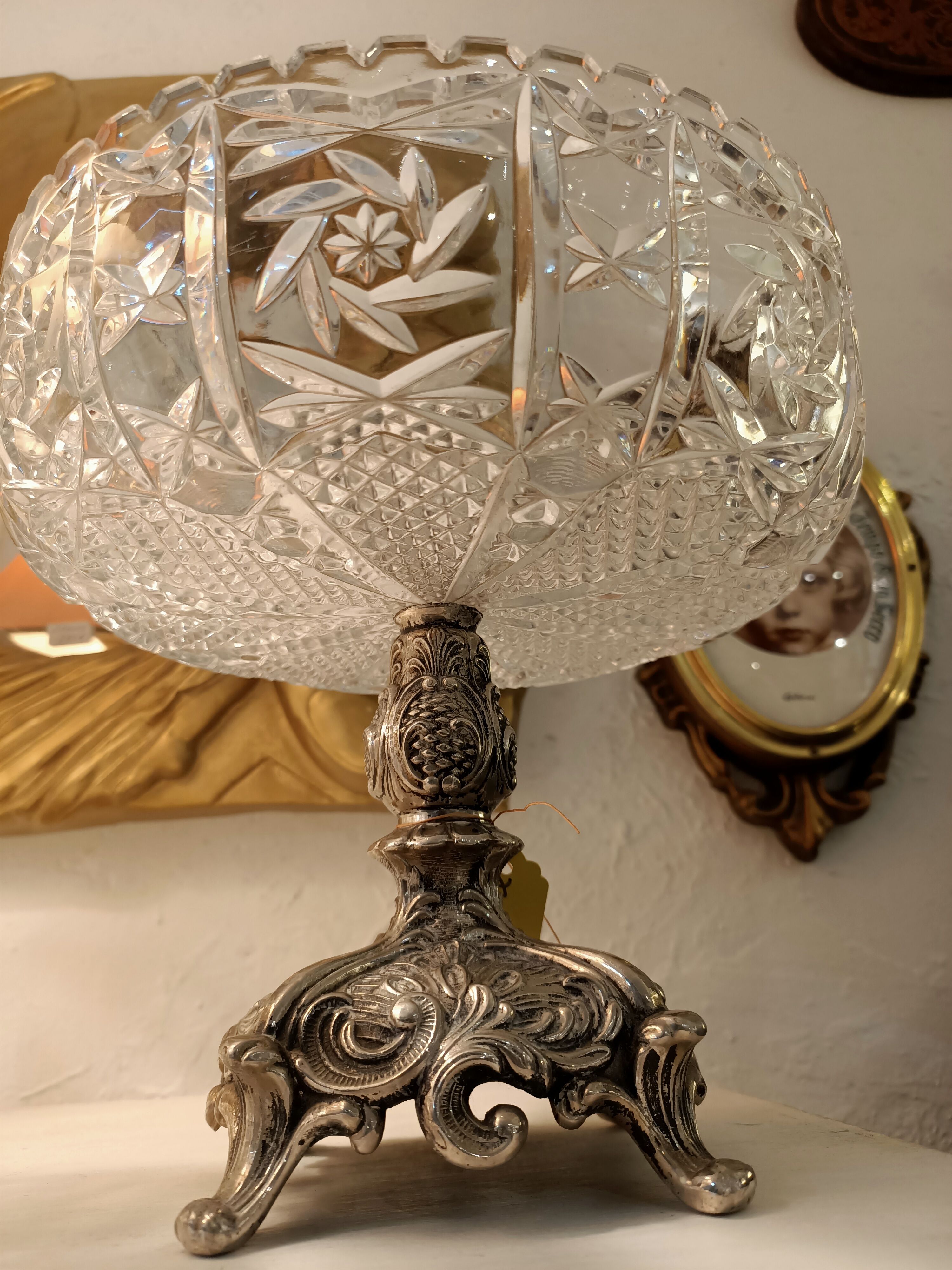 Crystal cut, silver metal.