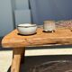 Coffee table in blond teak quadripod