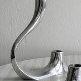Pair of designer candlesticks in chromed metal