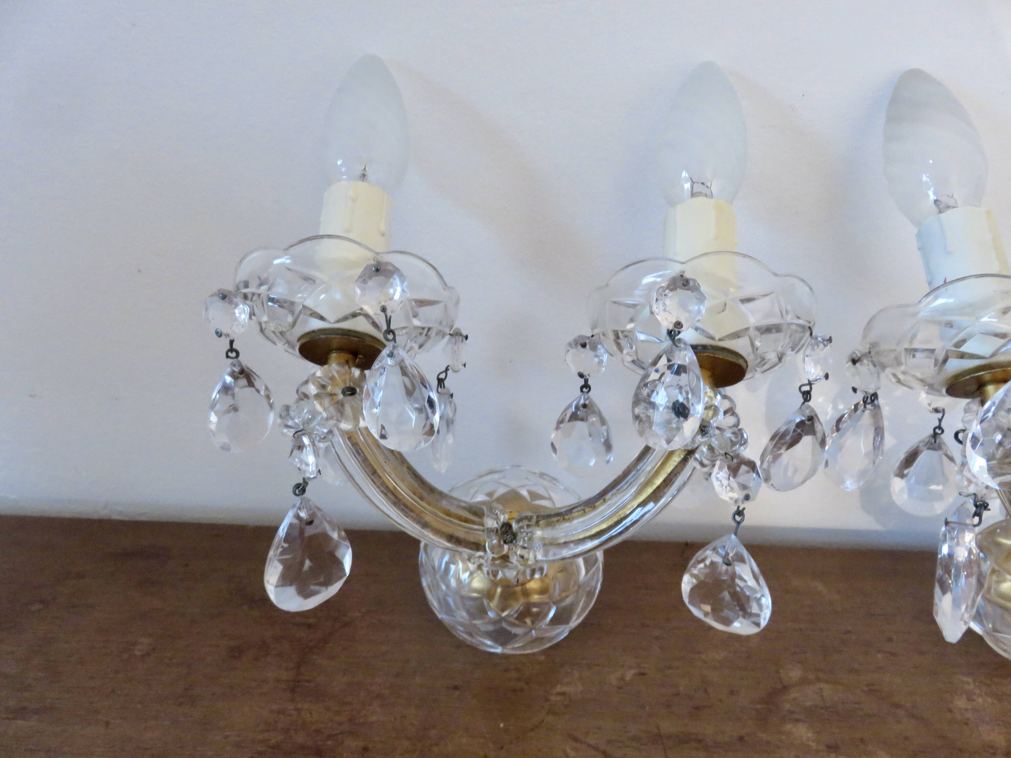 pair of double wall sconces with crystal pendants, made in Italy