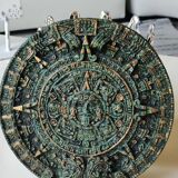 Aztec/Mayan wall solar mirror, in crushed Malachite stone, gold highlights