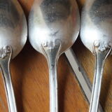 15 small silver metal spoons with rows of beads
