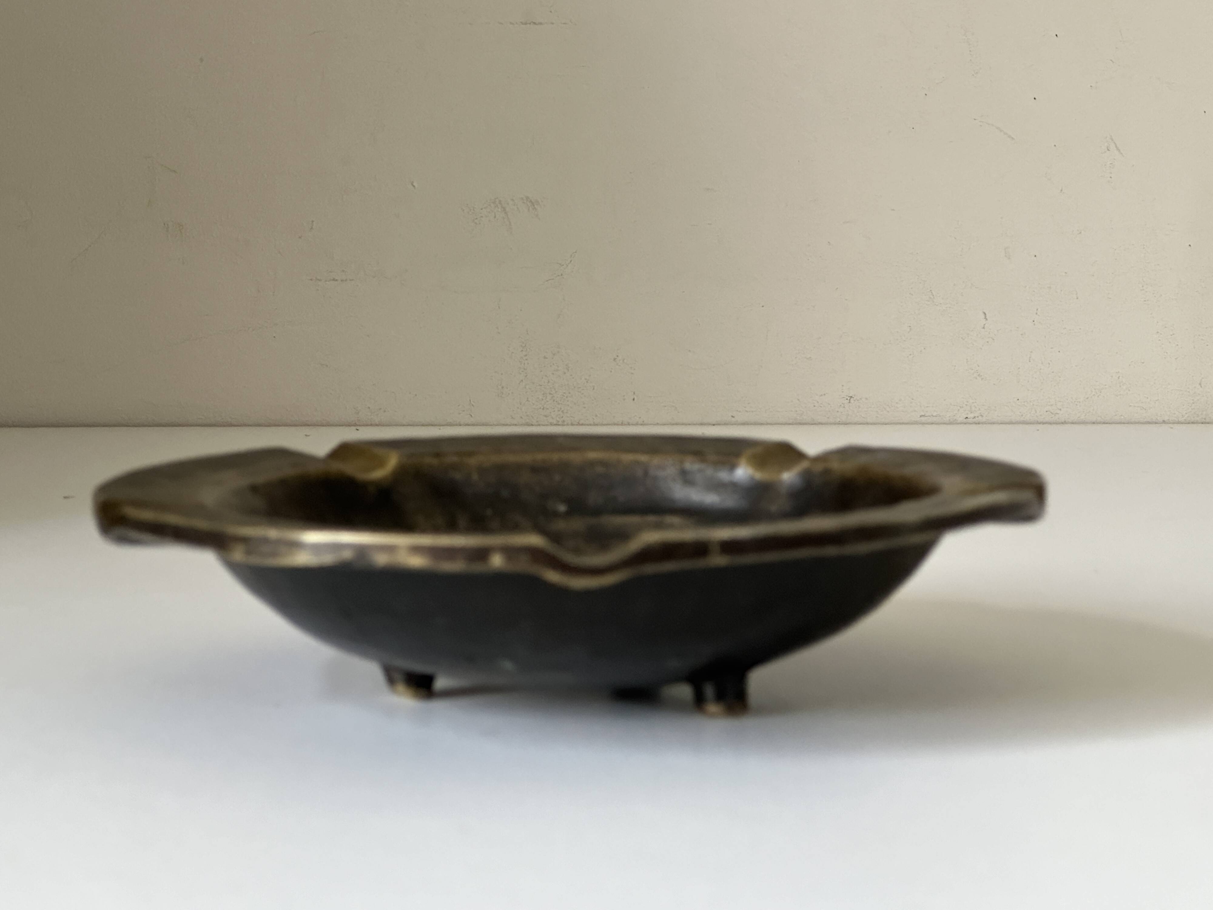 Vintage bronze ashtray design from the 60s