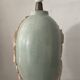 Vintage lamp base in Mactan stone and green marble.