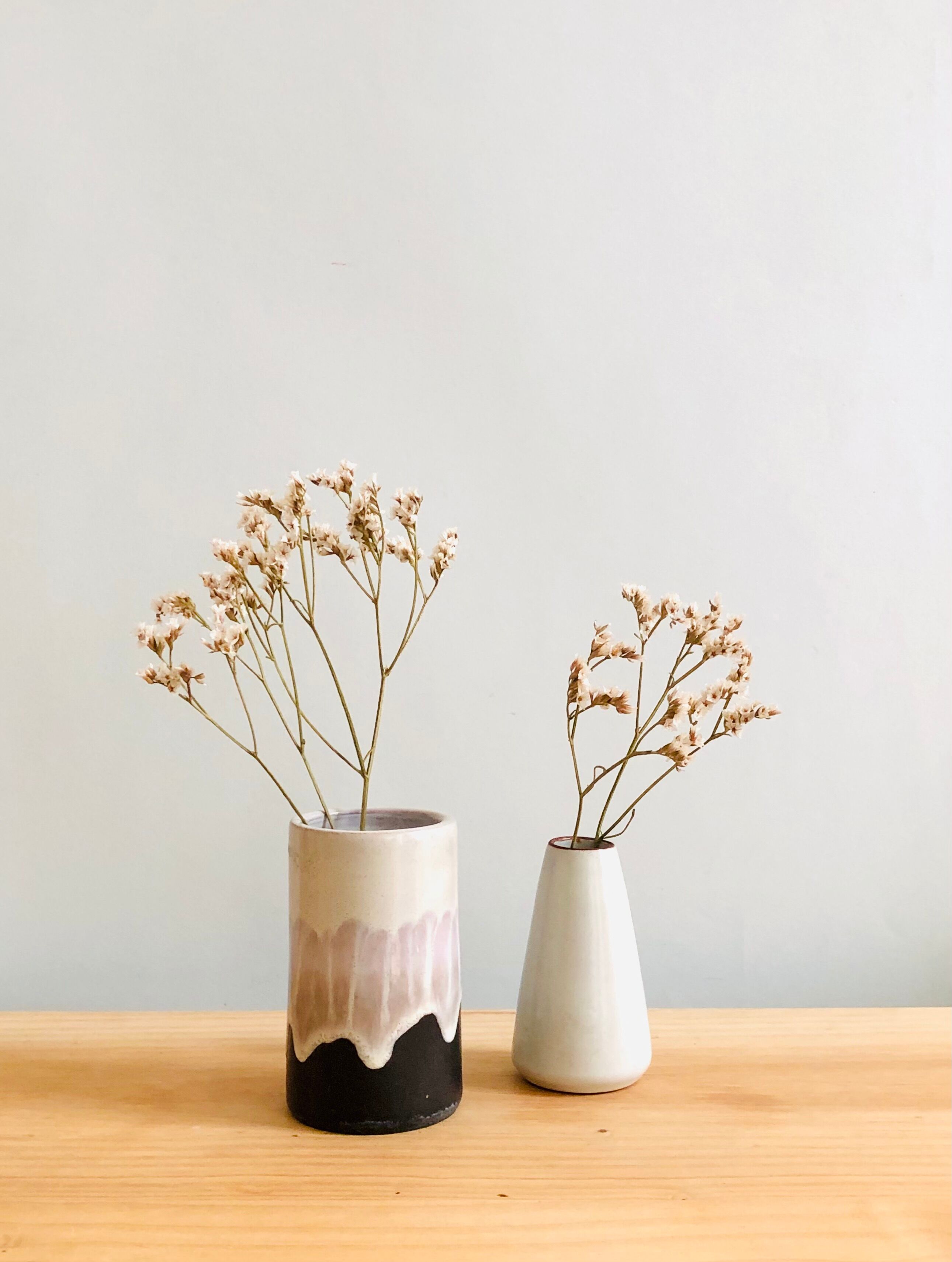 Duo of small ceramic vases