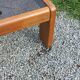 Coffee table from Regain in solid elm with a smoked glass top.