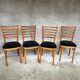 Set of 4 vintage wooden chairs with faux leather.
