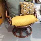 Swivel rattan armchair