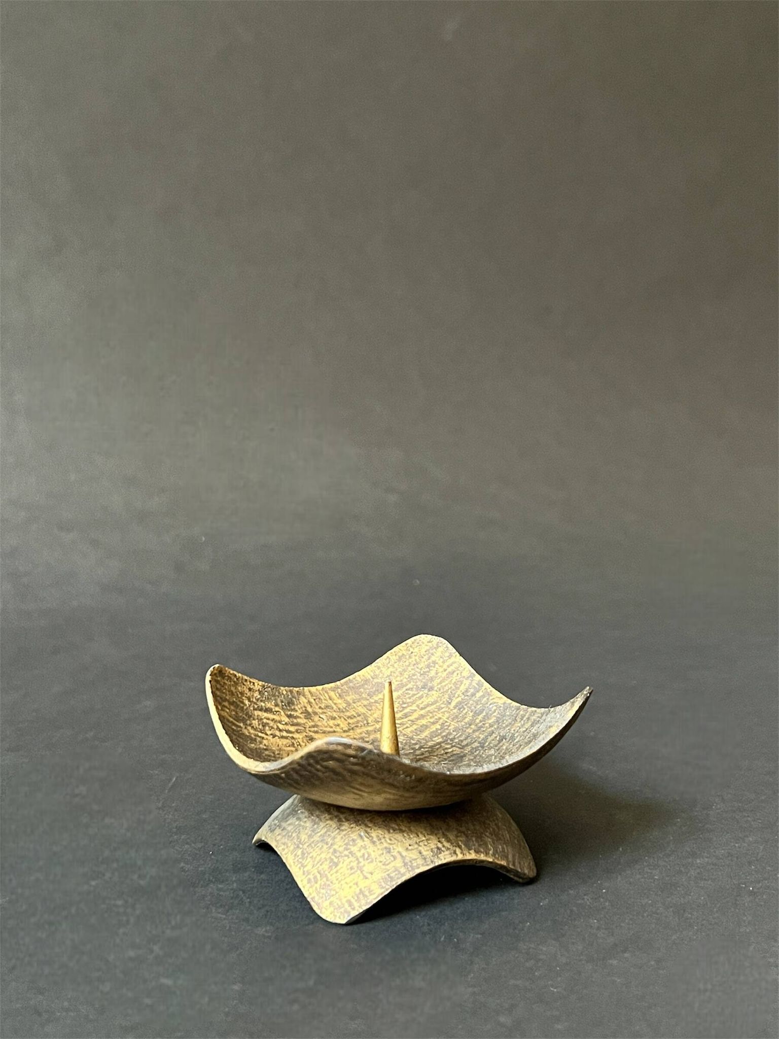 Hammered brass candle holder, brutalist design, 1970s