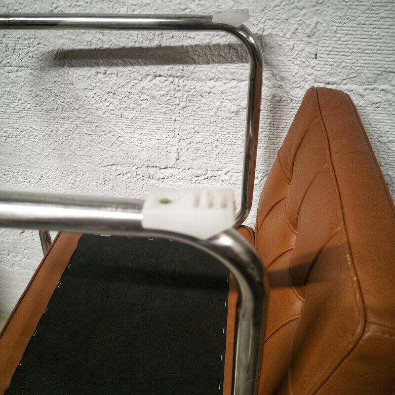 Pair of cantilever chrome and skaï chairs