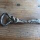 Silver metal rope bottle opener
