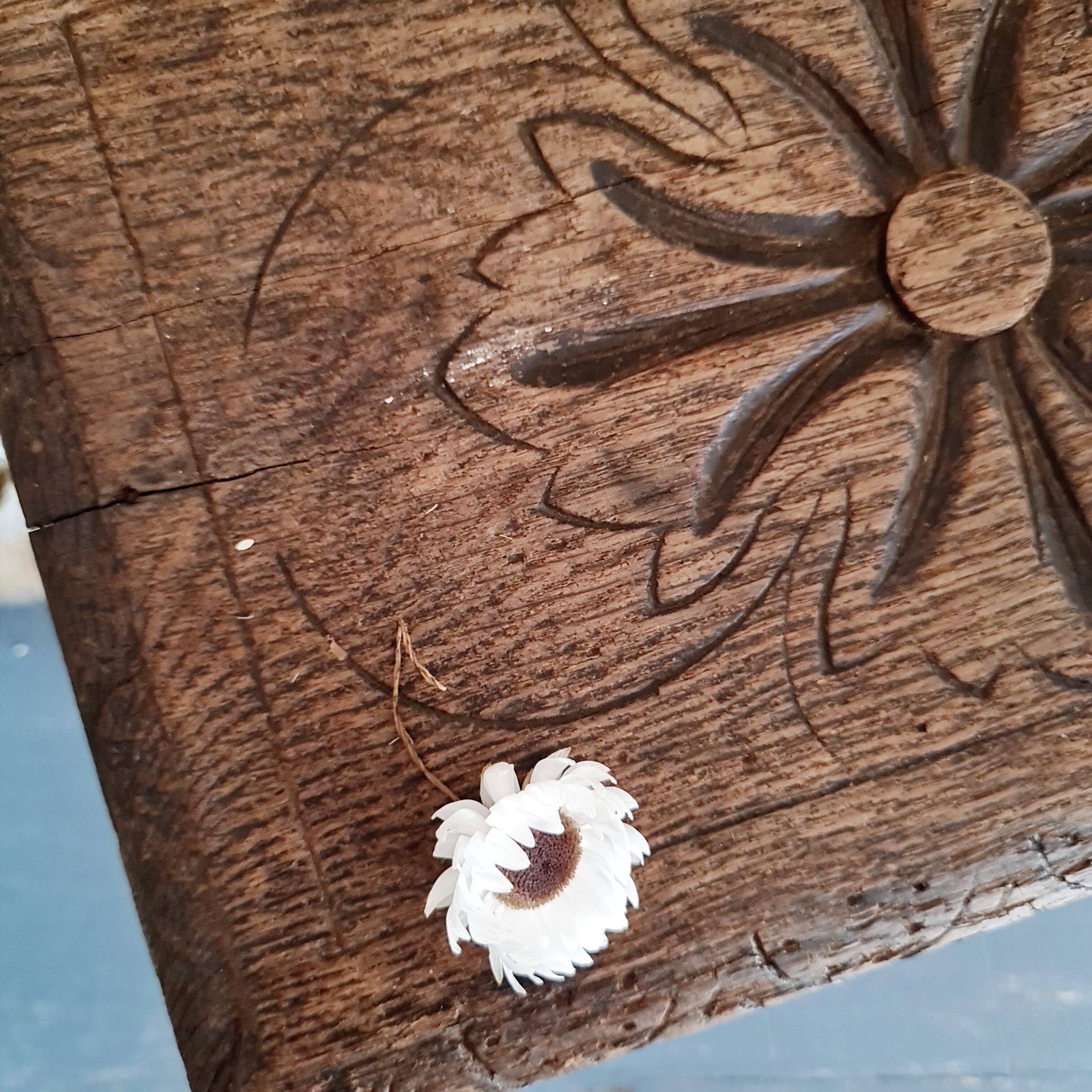 Small old carved wooden bench