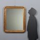 Antique carved and gilded wooden mirror, Italy, early 20th century.