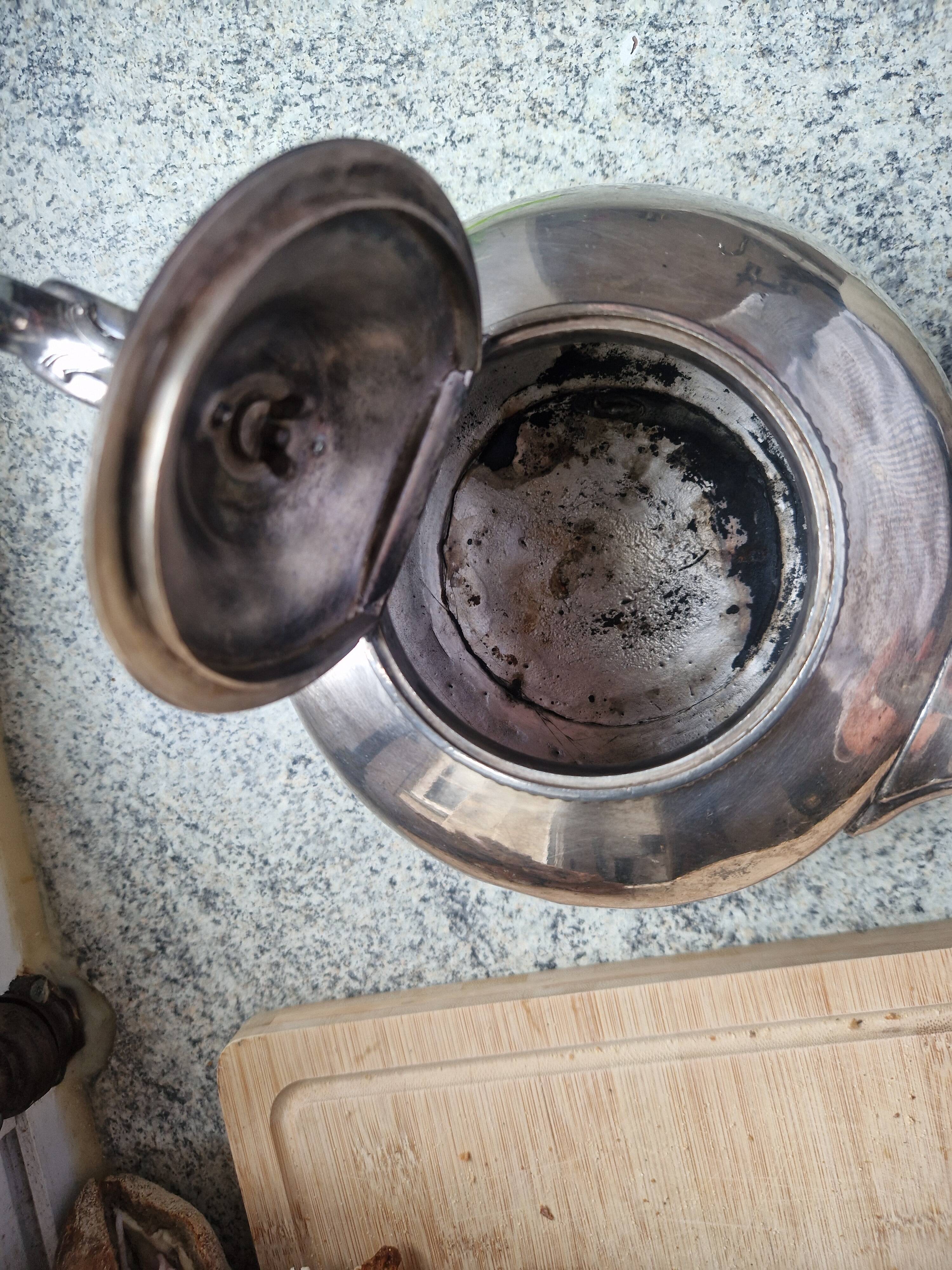 Silver-plated metal teapot in English style