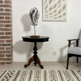 Two-tone black and mahogany pedestal table with mahogany veneer