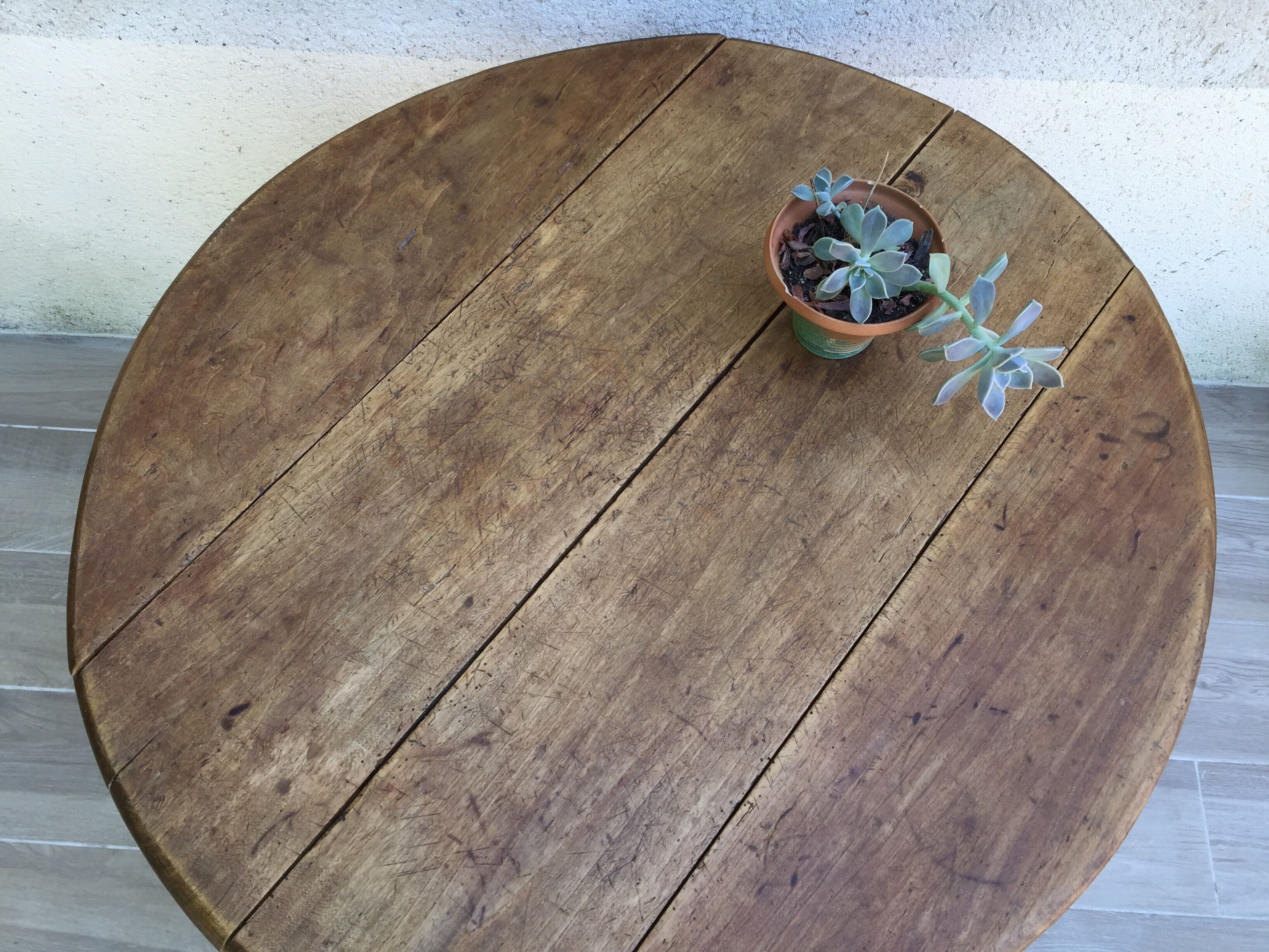 Round table at 2 vintage wood rabats