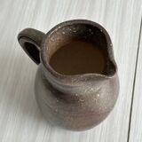 Brown handcrafted stoneware pitcher