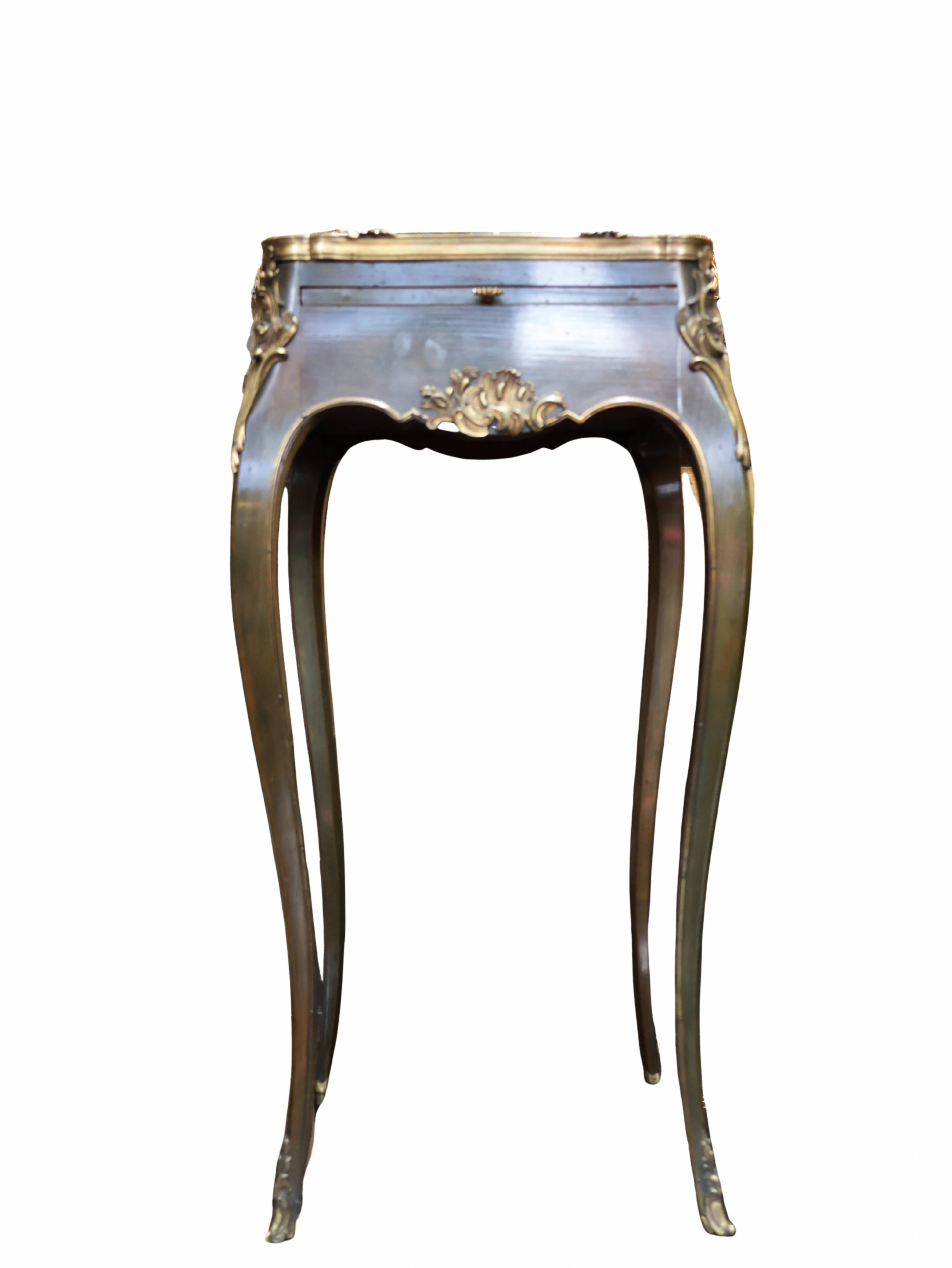 Japanese-style work table from the Napoléon III period in black lacquer and gilded bronze.