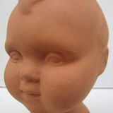Terracotta vase: child's head