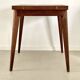 Table porte-feuille avec pieds compas