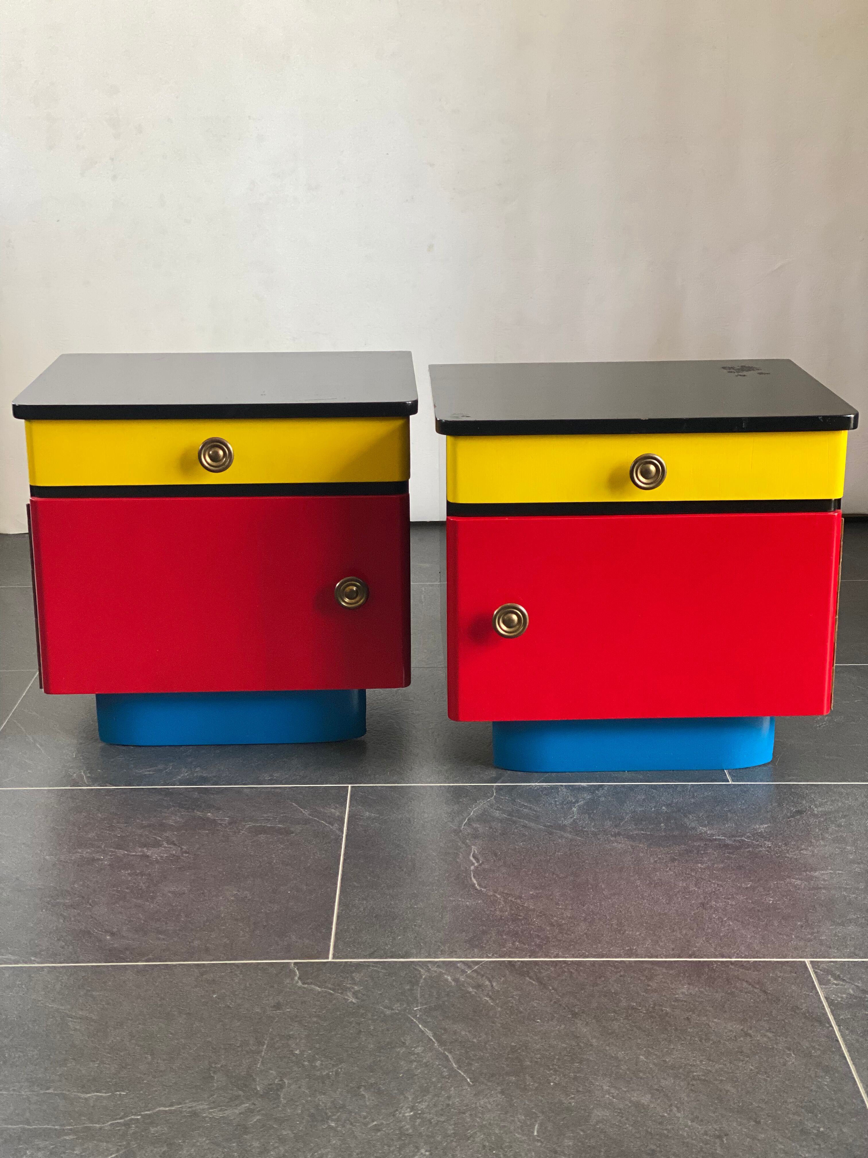 Pair of colorful massive teak night stands