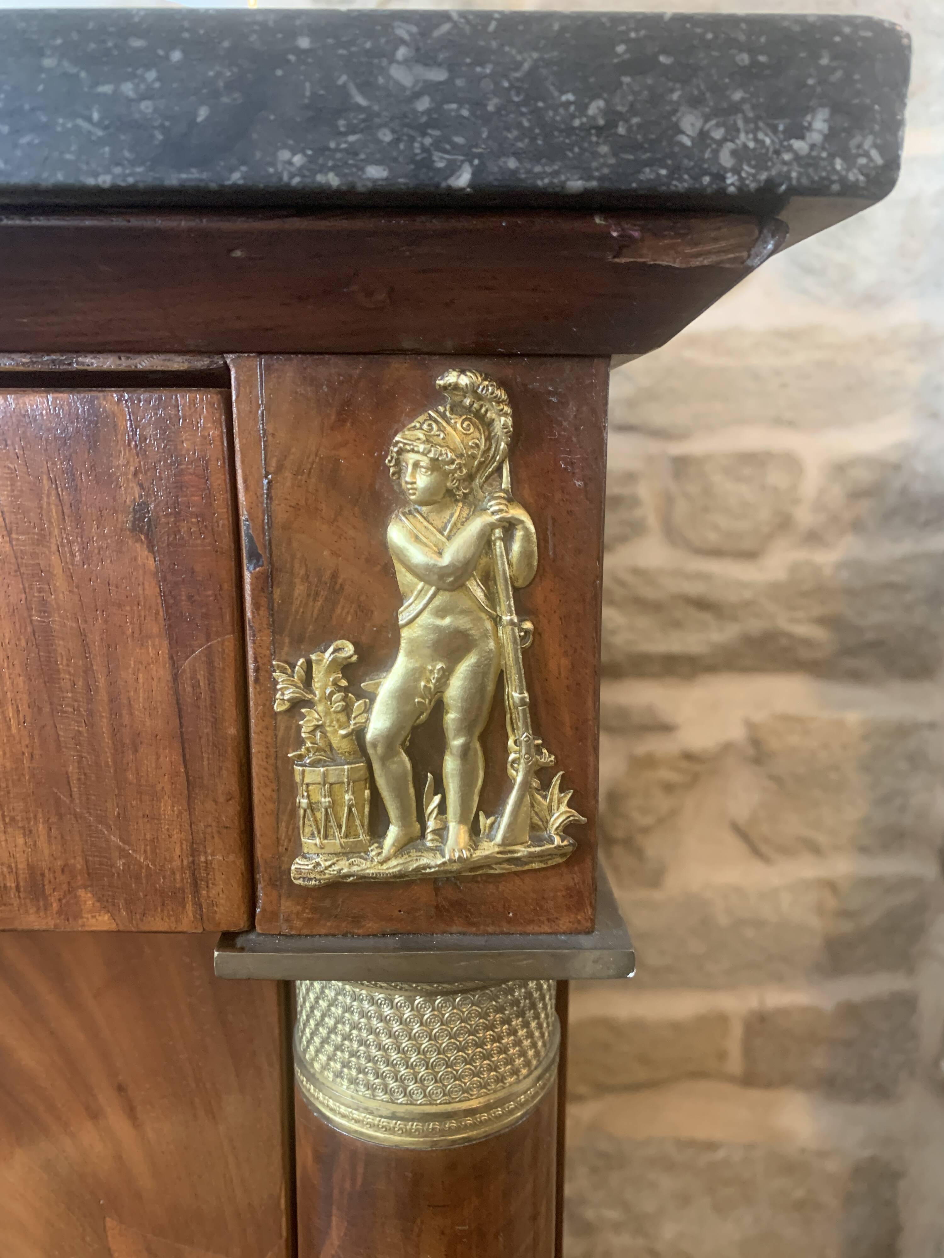 Empire chest of drawers with columns, 19th century mahogany