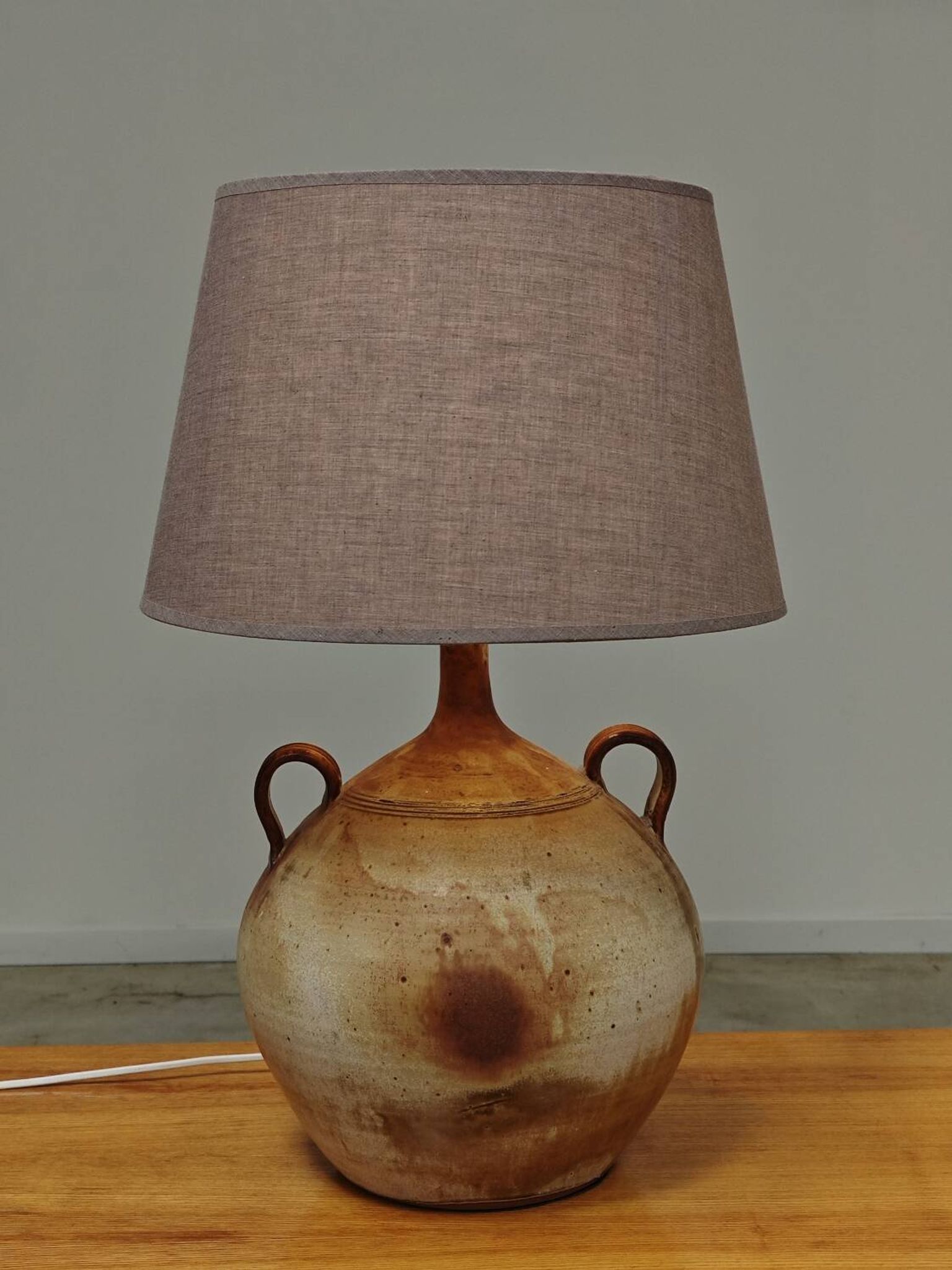 Modernist ceramic sandstone lamp with two handles from the 1950s