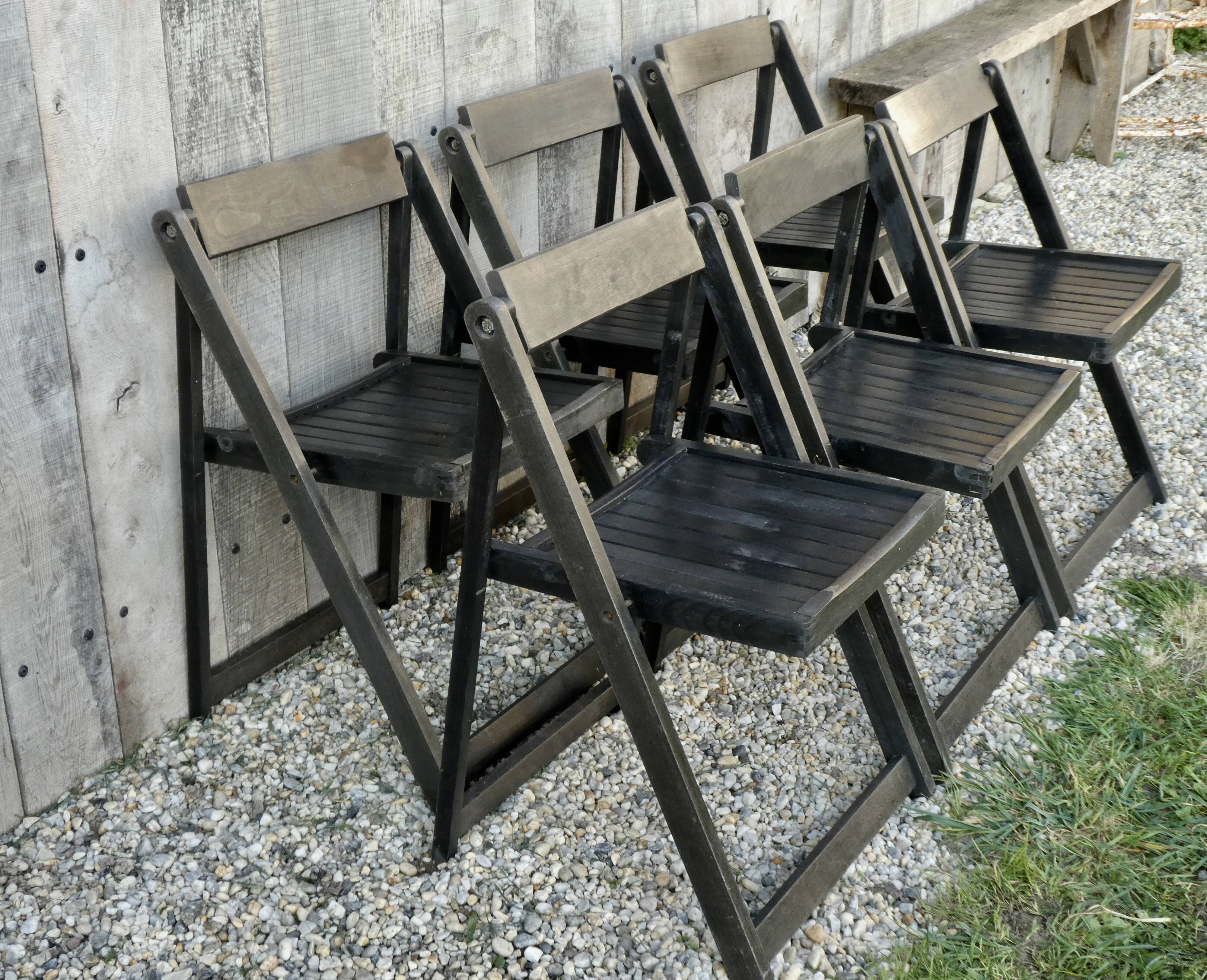 Lot of 6 folding wooden chairs, black patina