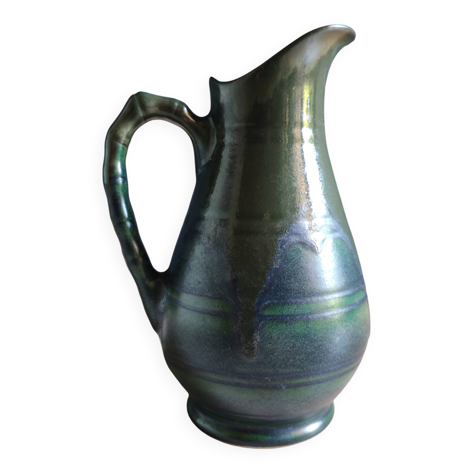 Vintage ceramic pitcher vase in glazed green and blue.