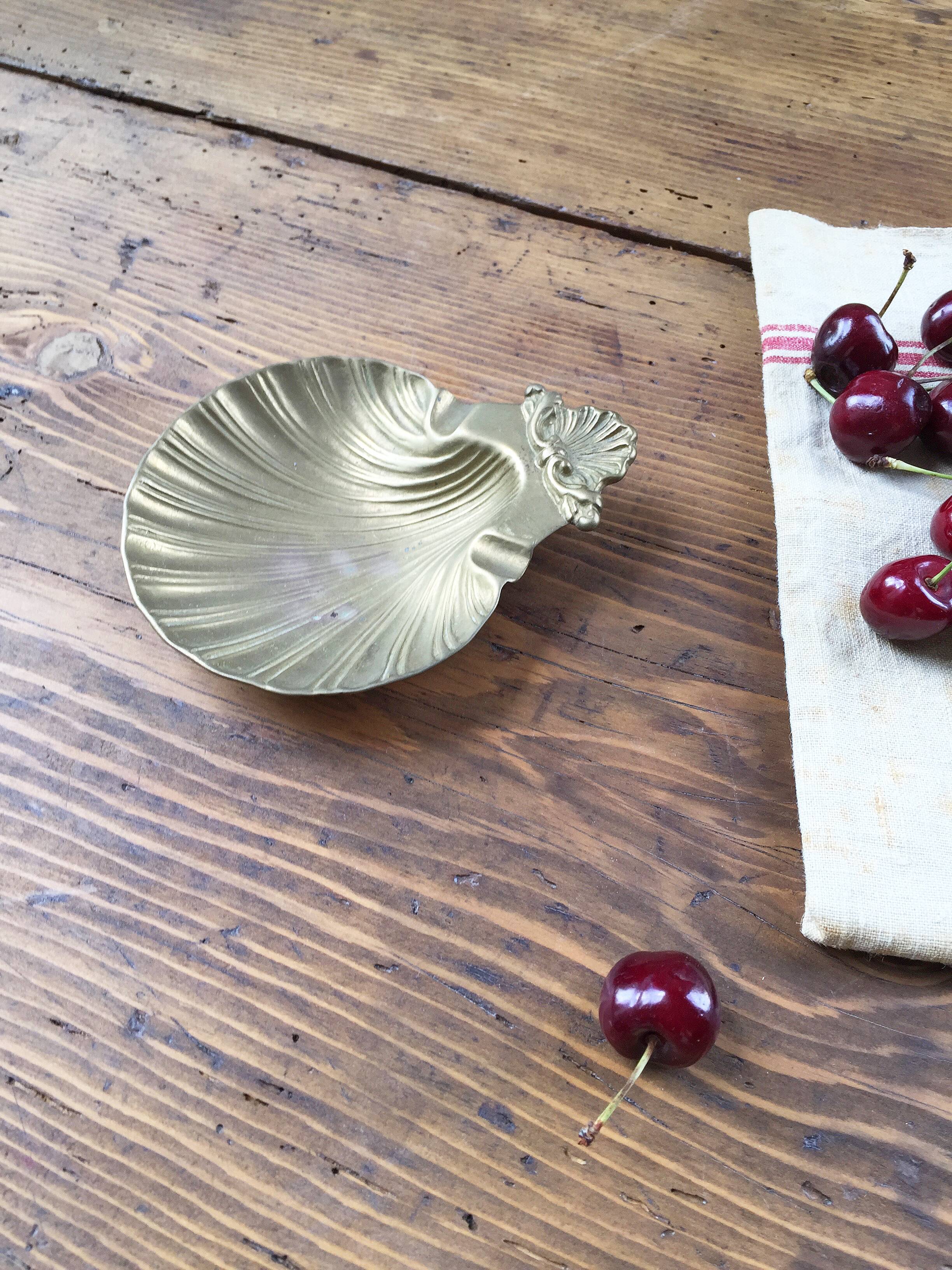 Shell brass ashtray