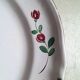Hand-painted faience plate from the east of France, 18th century.