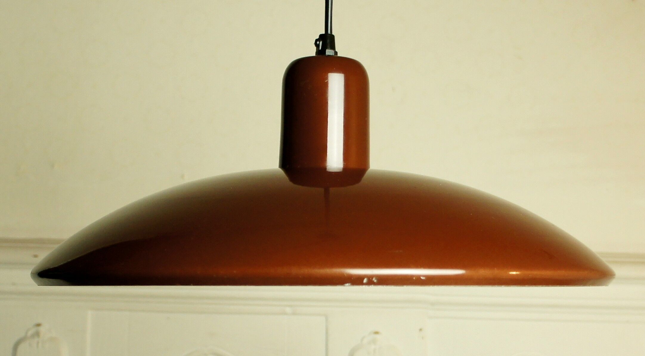 UFO chocolate lacquered metal hanging