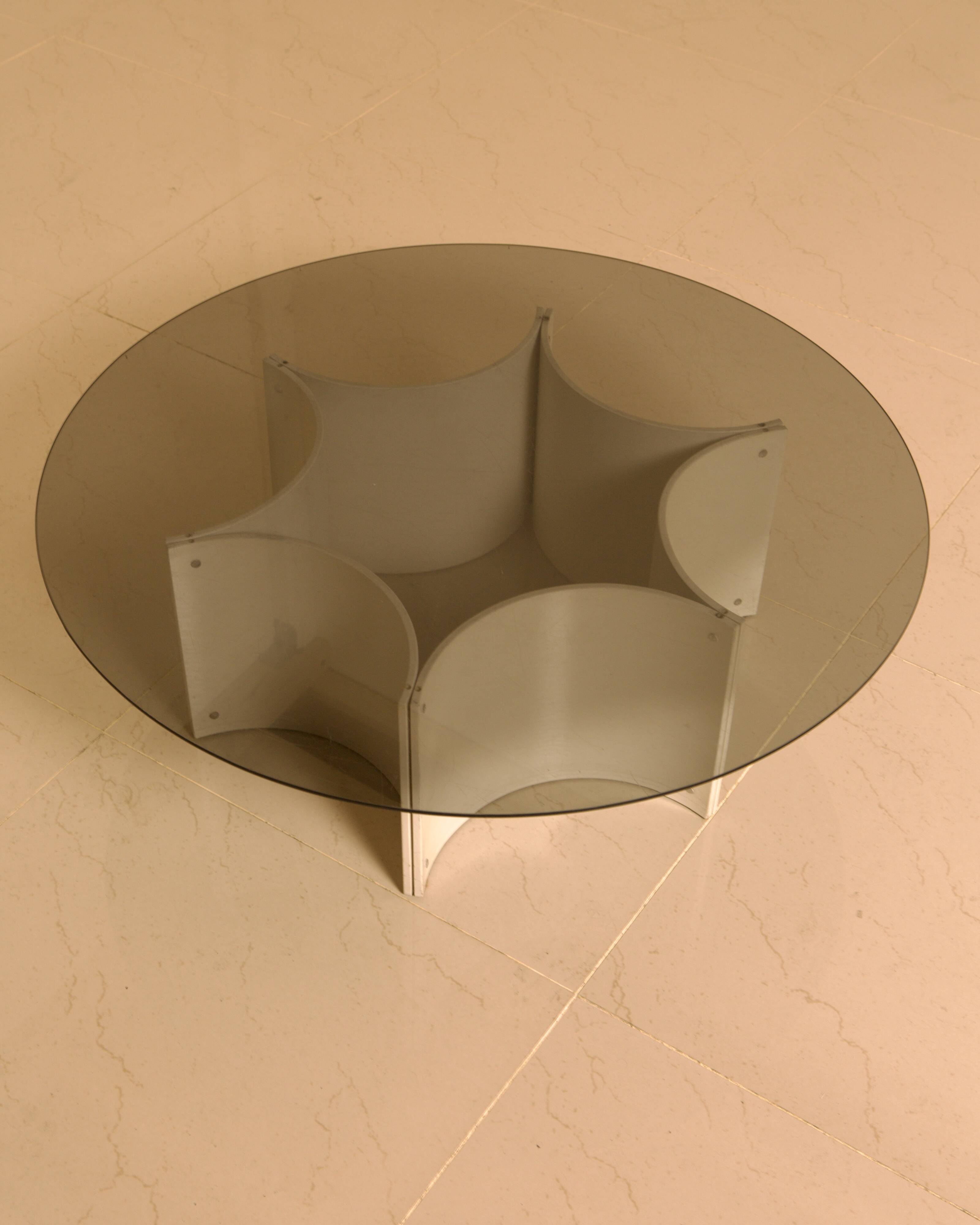 "Space Age" coffee table with star base and smoked glass top from the 70s.