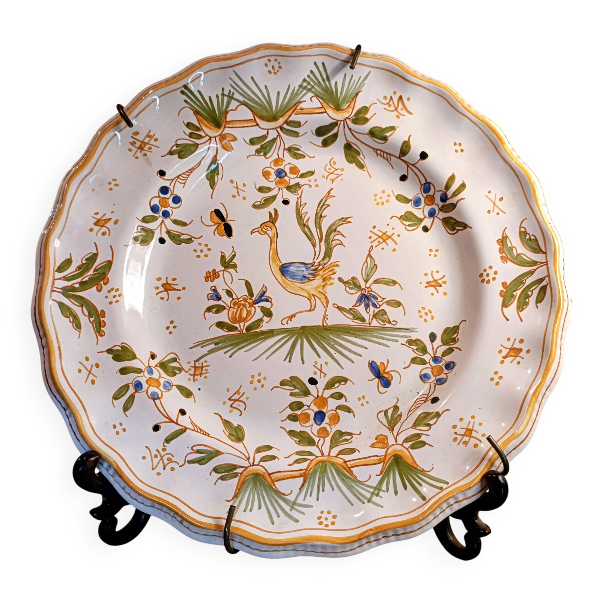 Antique Moustiers faience plate with handmade bird decoration