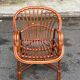 Adult rattan and wicker armchair, 1975, with beige cushion