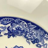Plat ancien en faïence bleue, décor floral et oiseaux, début XXe