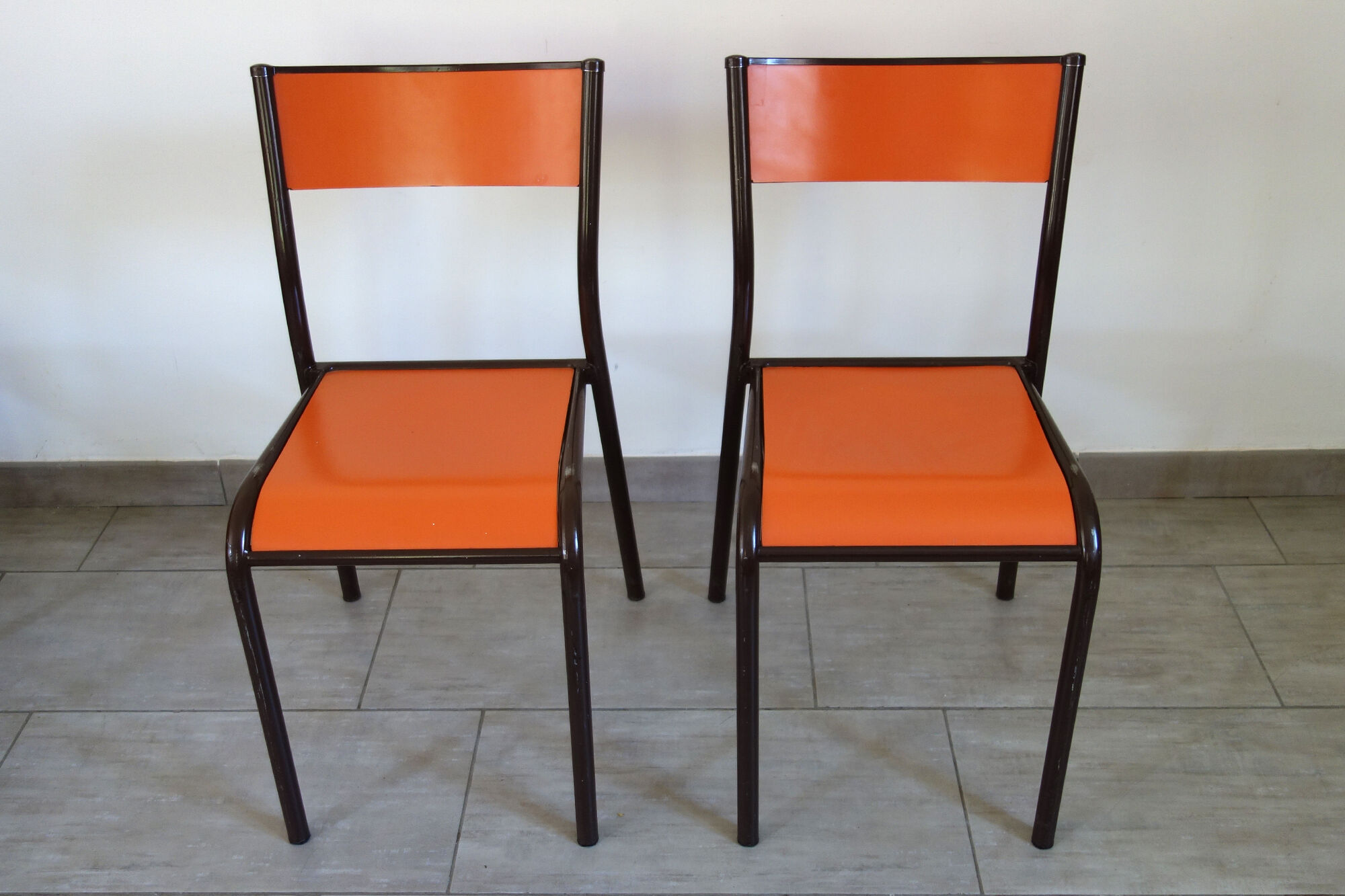 Set of 4 orange school chairs