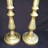 Former pair of bronze candlesticks