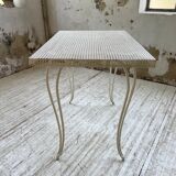Perforated garden dining table