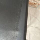 Armchair in black lacquered metal