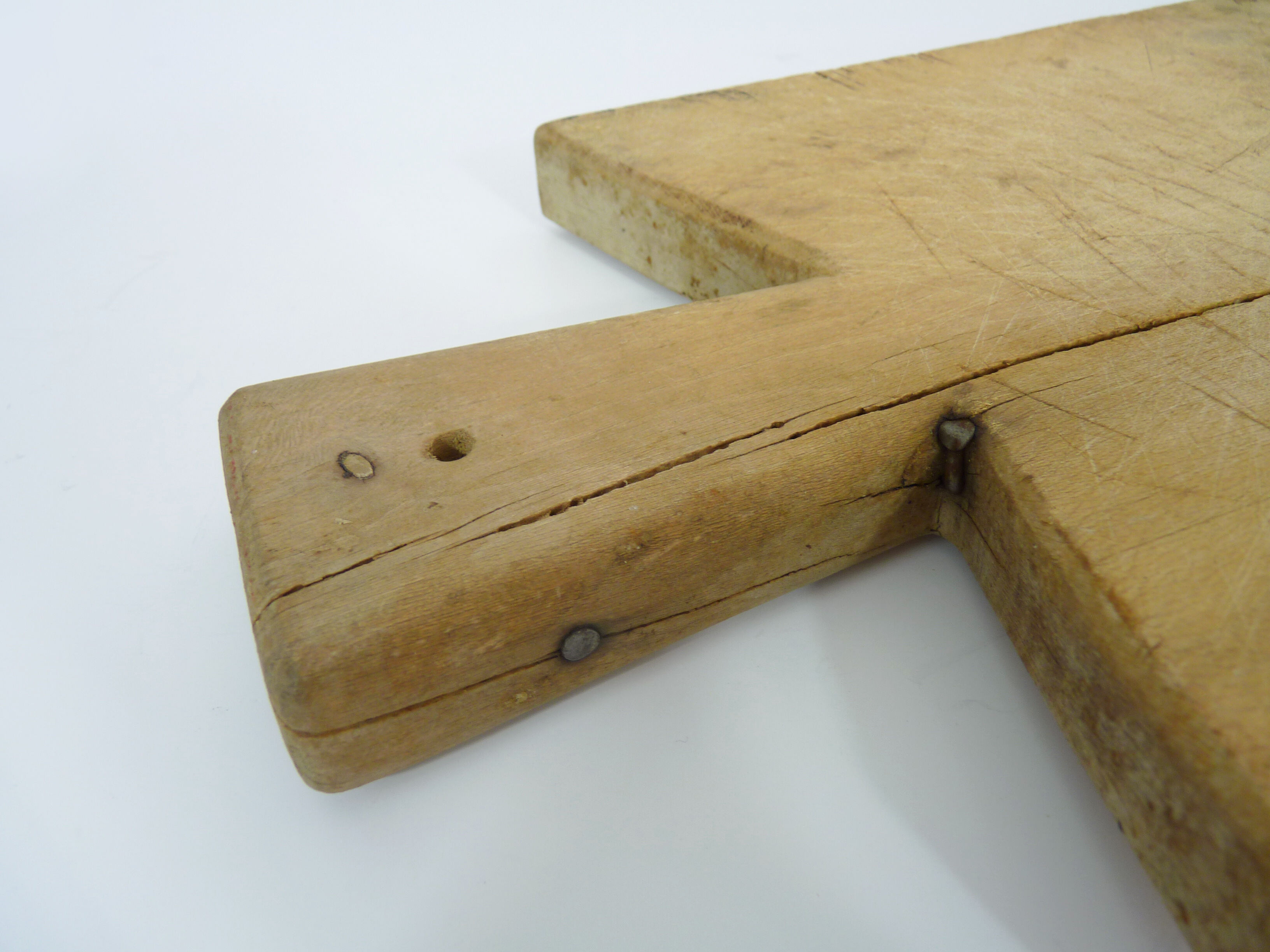 Small and old wooden cutting board. Year 50