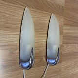 Pair of 1950s designer glass wall lights.