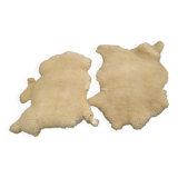Two vintage sheepskins.