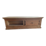 Base-shaped coffee table in light ash with a drawer and a compartment