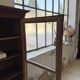 Glass-fronted walnut library 1900