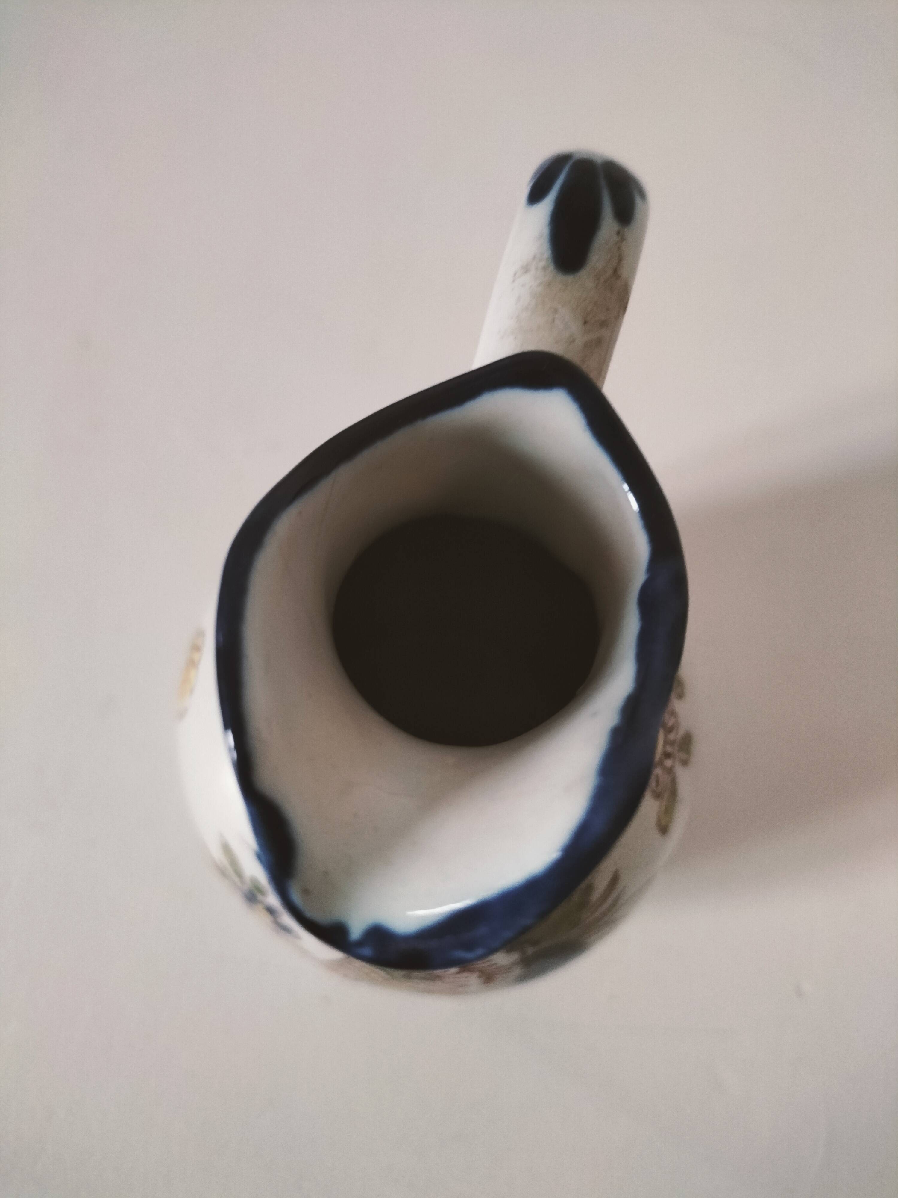 Small Malicorne pitcher with hand-painted floral decoration