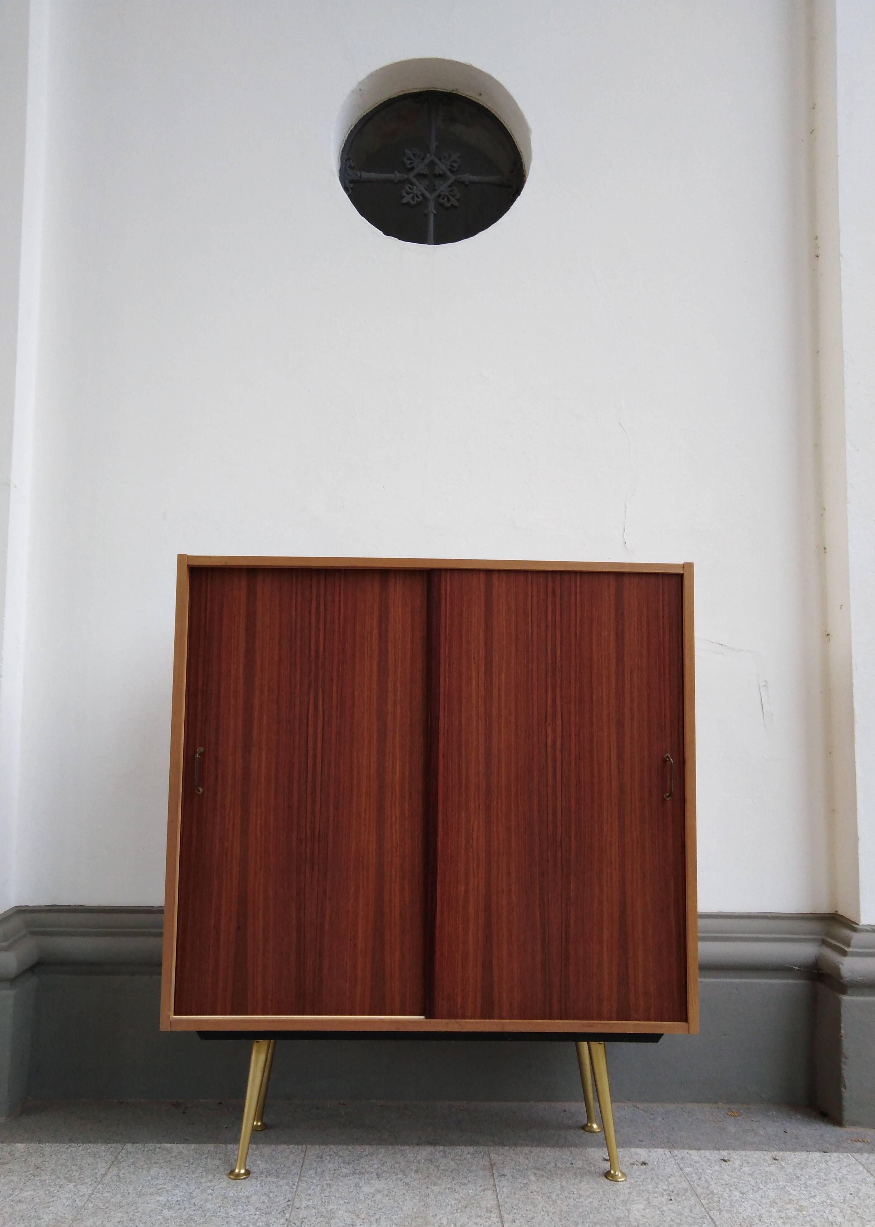 Mid Century cabinet with brass legs