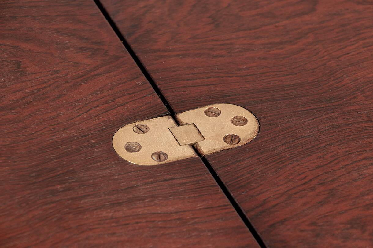 Danish extendable dining table in rosewood and brass by Poul Volther