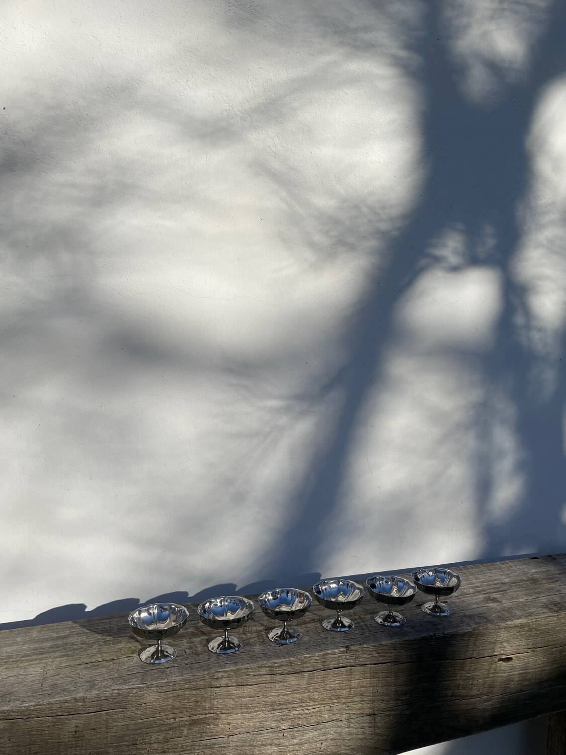 6 stainless steel cups on foot 1970